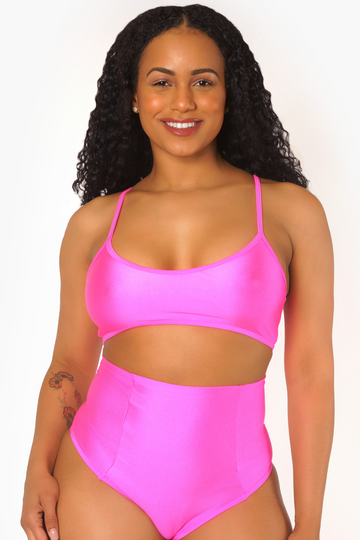 Top corto con espalda de nadador en color rosa neón